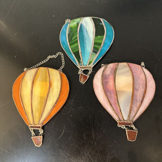 multi colored small hot air balloons